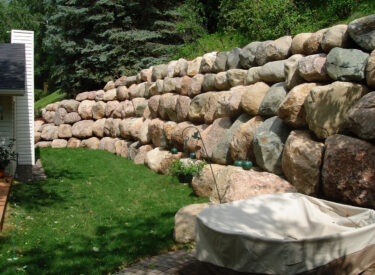 Boulder retaining wall