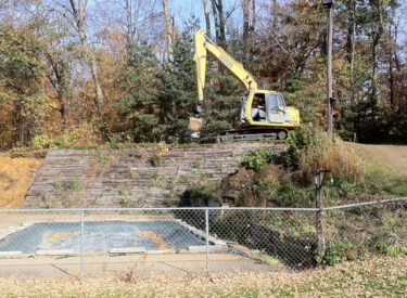 Removing existing wood retaining wall