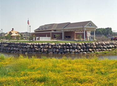 Boulder retaining wall - shoreline  